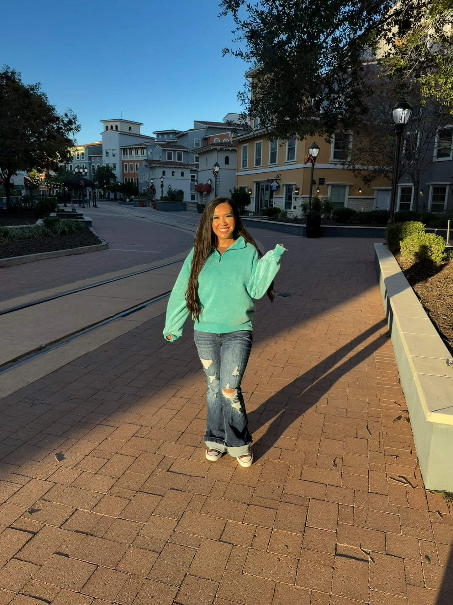 Holly washed pull over in the color TEAL