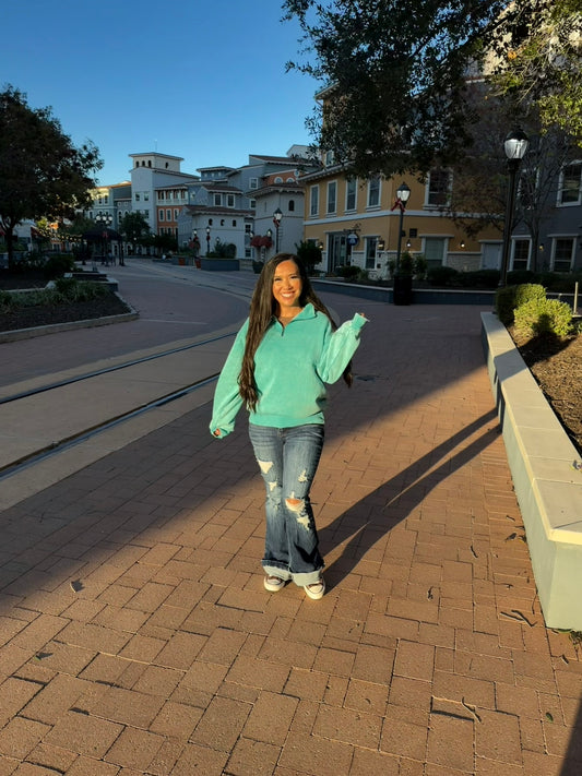 Holly washed pull over in the color TEAL
