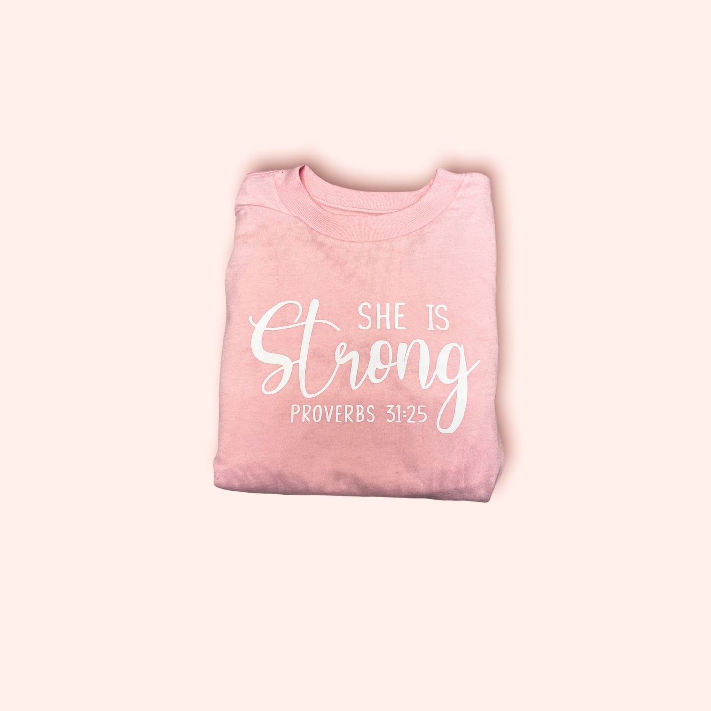 She is Strong Proverbs 31:25 pink T-shirt